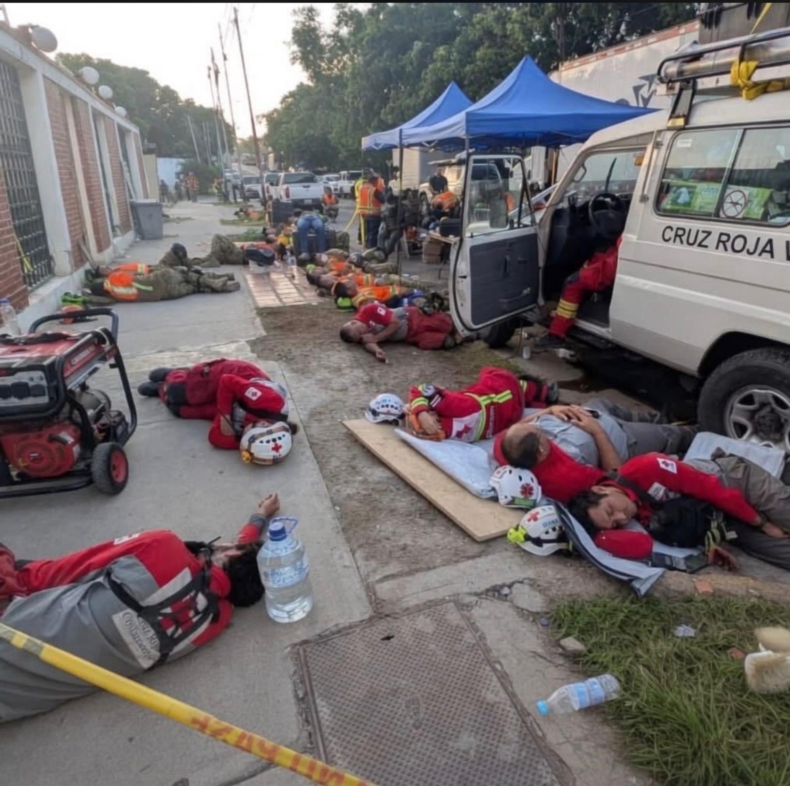 Rescue teams from Costa Rica exhausted after many long hours in the 90 degree heat